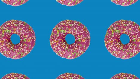rosas rosquillas en patrón geométrico sobre un fondo azul. gráficos de movimiento simples animación de concepto de comida