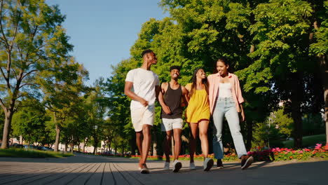 friends walking in a park on a sunny day