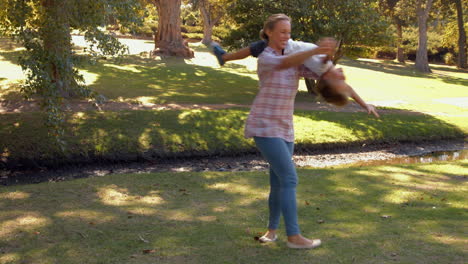 Mother-playing-with-her-son-in-the-park