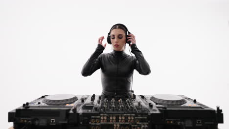 female dj performing in a studio