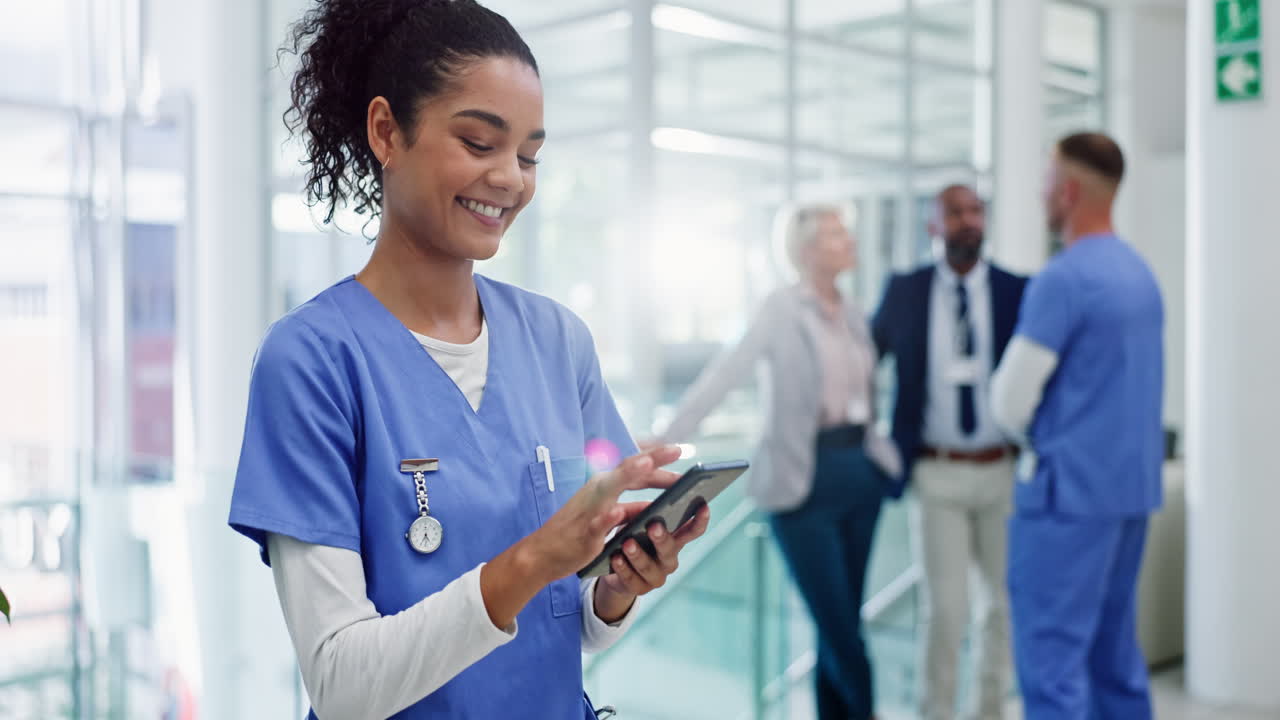 Nurse Using Smartphone in Hospital