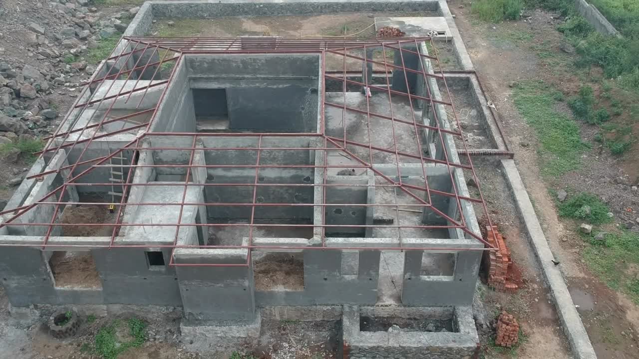 imágenes aéreas de una casa en construcción | bienes raices en india