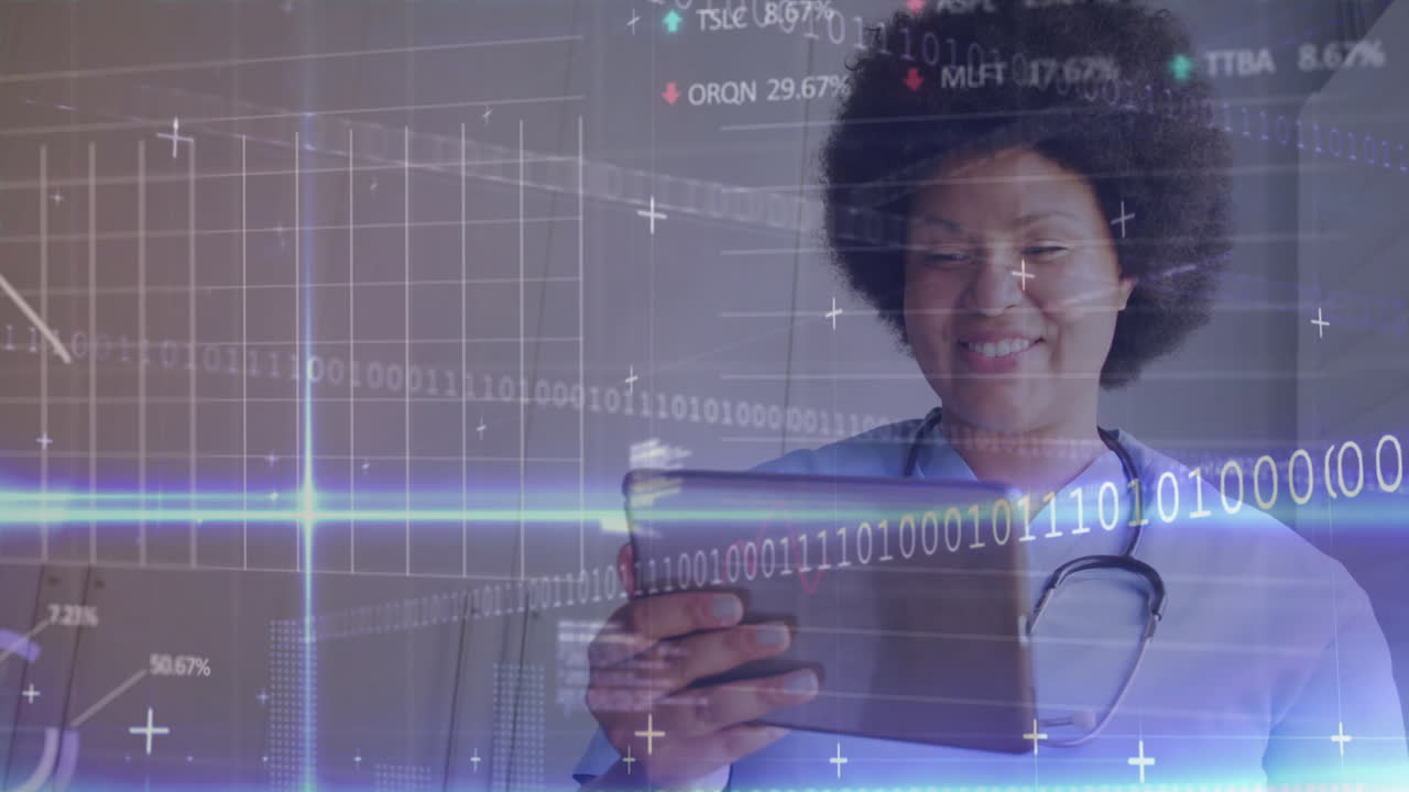 Using tablet with digital data, healthcare professional viewing animation in hospital