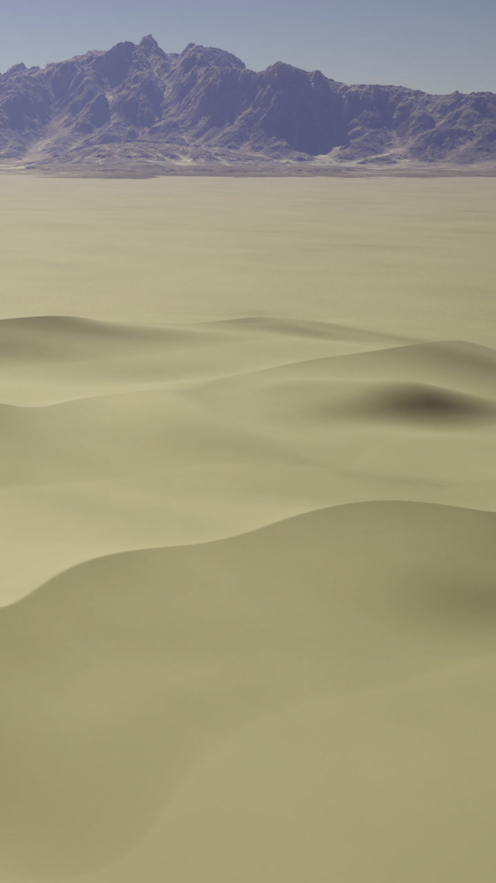 Vast desert landscape reveals waves of golden sand under a serene sky