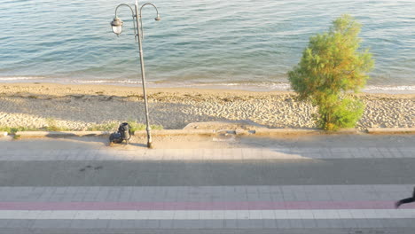 men on water front in the morning