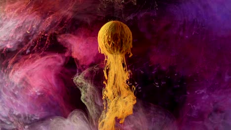 multicolored ink paint slowly flows from the ball