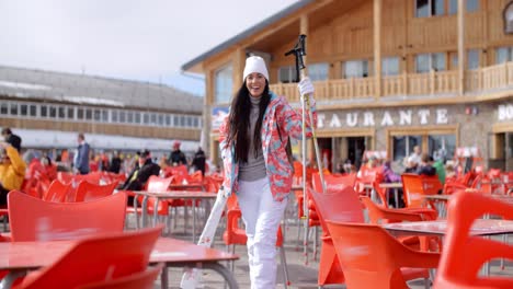 Young-woman-posing-at-a-ski-resort-restaurant