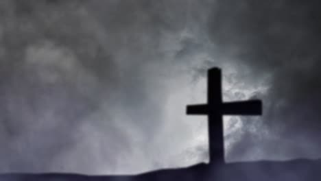 foreground blur silhouette cross and thunderstorm