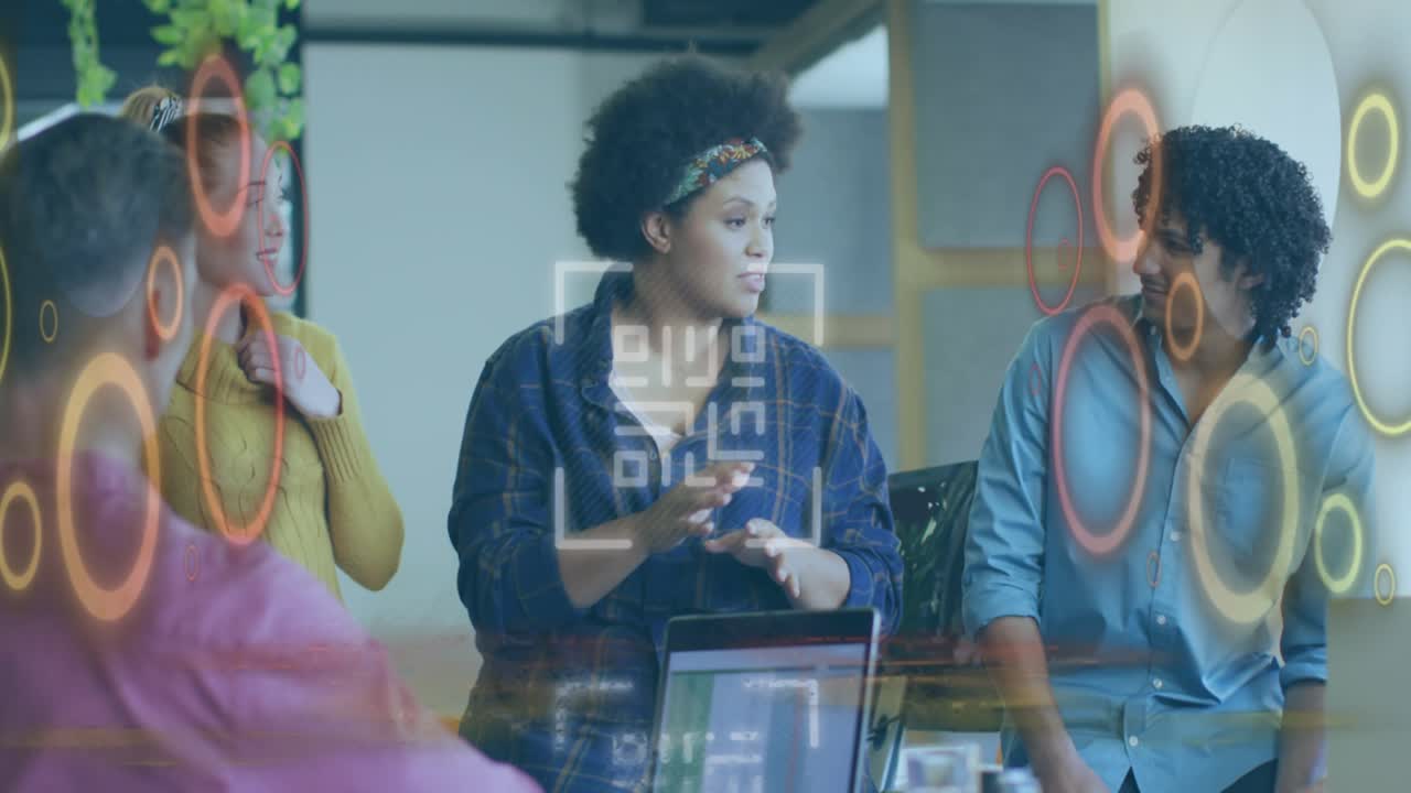 Animation of qr code and data processing over diverse business people in office