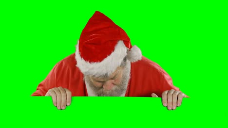 Überraschter-Weihnachtsmann,-Der-Sich-Hinter-Einem-Grünen-Bildschirm-Versteckt