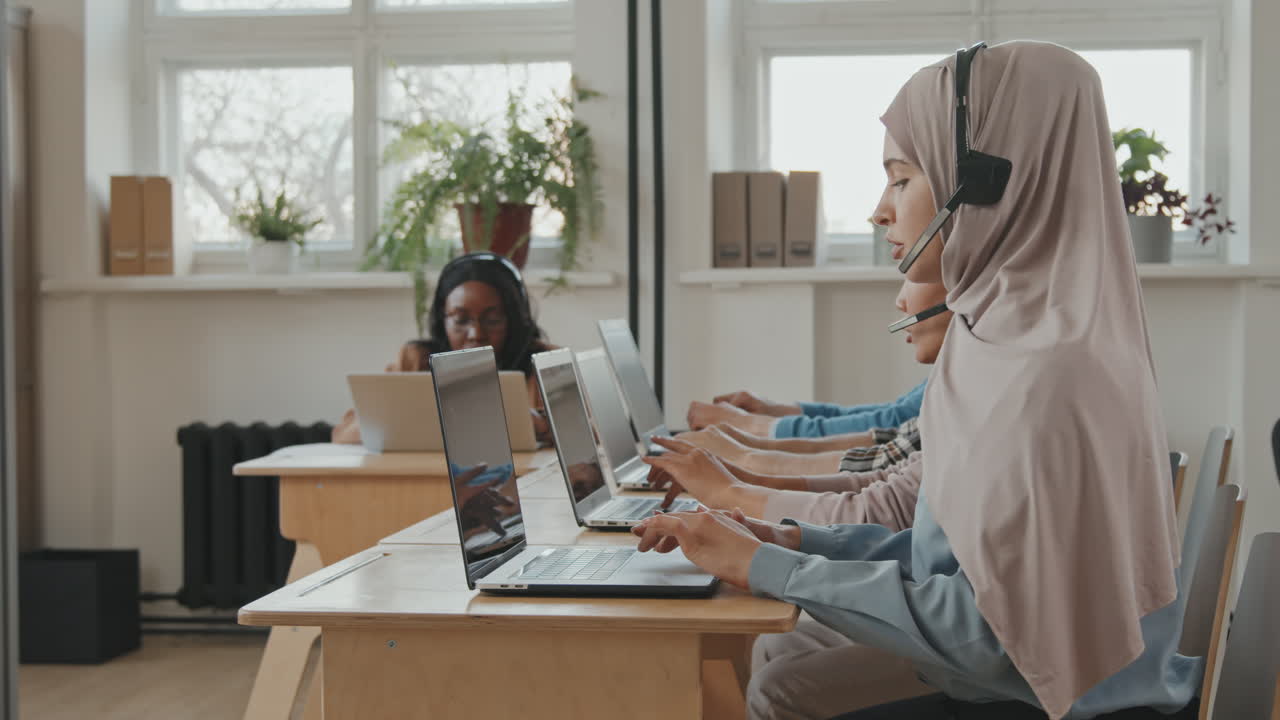 Portrait of Happy Muslim Woman Working at Call Center