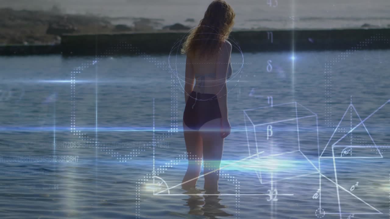 Donna che entra in acqua costiera profonda fino al ginocchio e attiva forme d'onda e cubi per visualizzazioni tecnologiche.