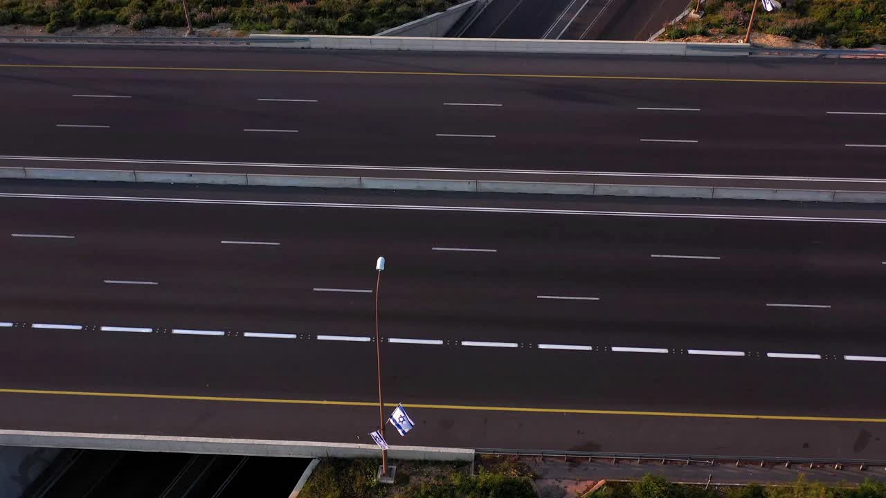Aerial view of an empty multi-lane highway with road markings