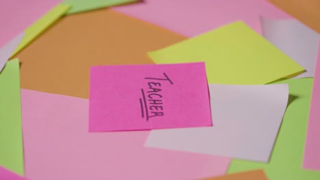 Education-Concept-Of-Revolving-Sticky-Notes-With-Teacher-Written-On-Top-Note-1