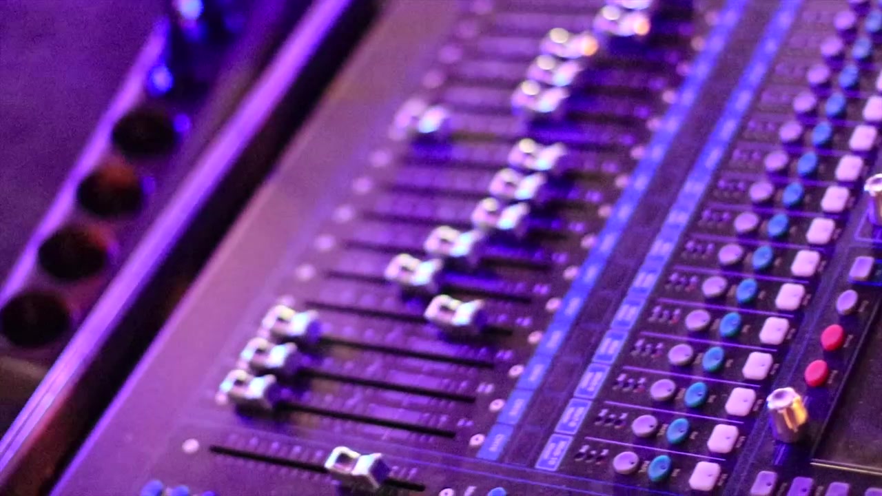 DJ mixer slow motion close up shot. Sound mixer used for parties.