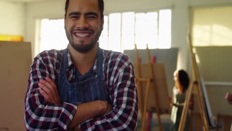 Portrait-of-happy-man-standing-with-arms-crossed-4k