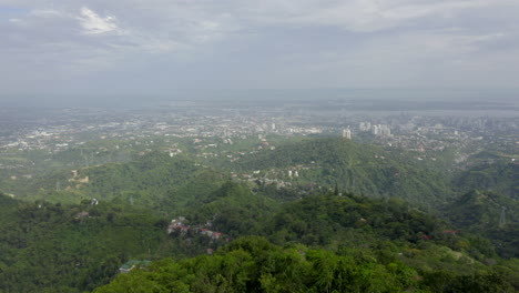 aerial drone video above a green jungle in a warm tropical foreign country-16