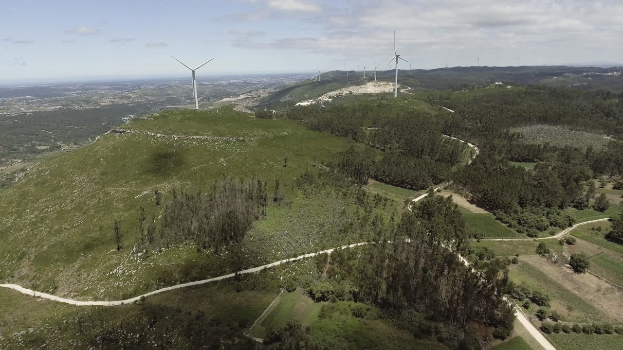 Windmills and green landscape of Reguengo Do Fetal in Leiria, Portugal - Aerial