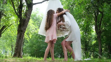 little sister hands shoes to sister brides emotional moment little sister hands shoes to sister brides emotional moment morning of the bride wedding day