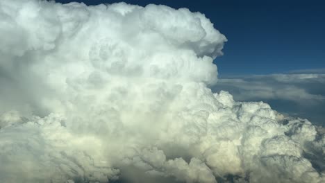 pov shot of an aeroplane flying above the cloud, aerial