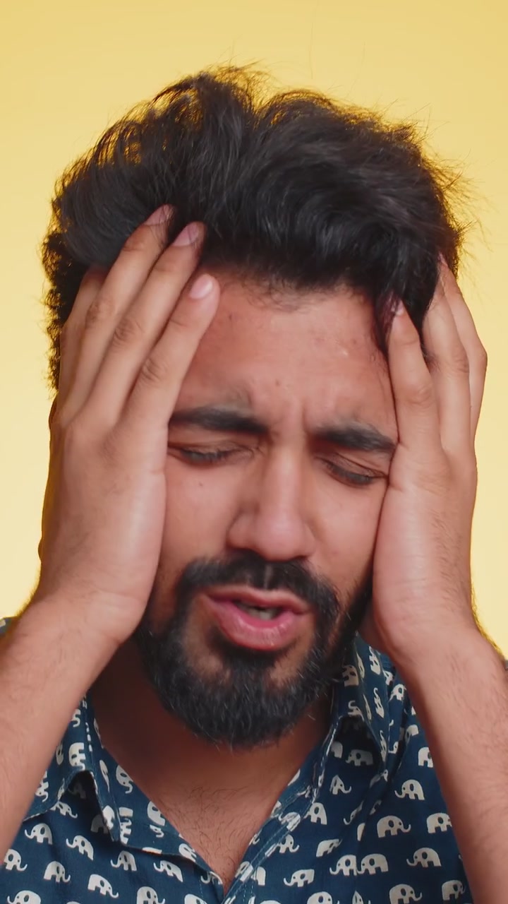 Bearded indian man loses becoming surprised by lottery results bad fortune loss unlucky news