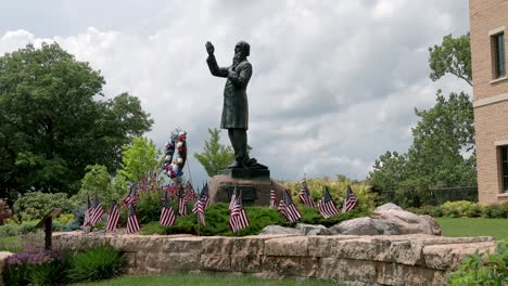 statue of father william corby on the campus of notre dame university in south bend, indiana with stable video shot