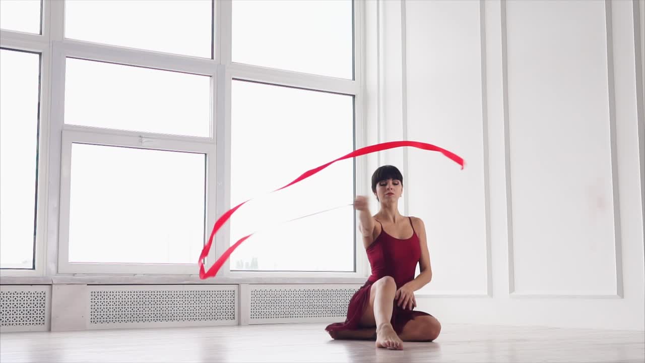 Woman performing a ribbon dance routine