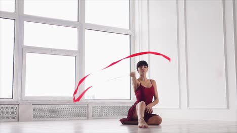 woman performing a ribbon dance routine
