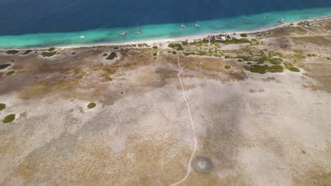 aerial establishing shot of the klein curacao island in the caribbean