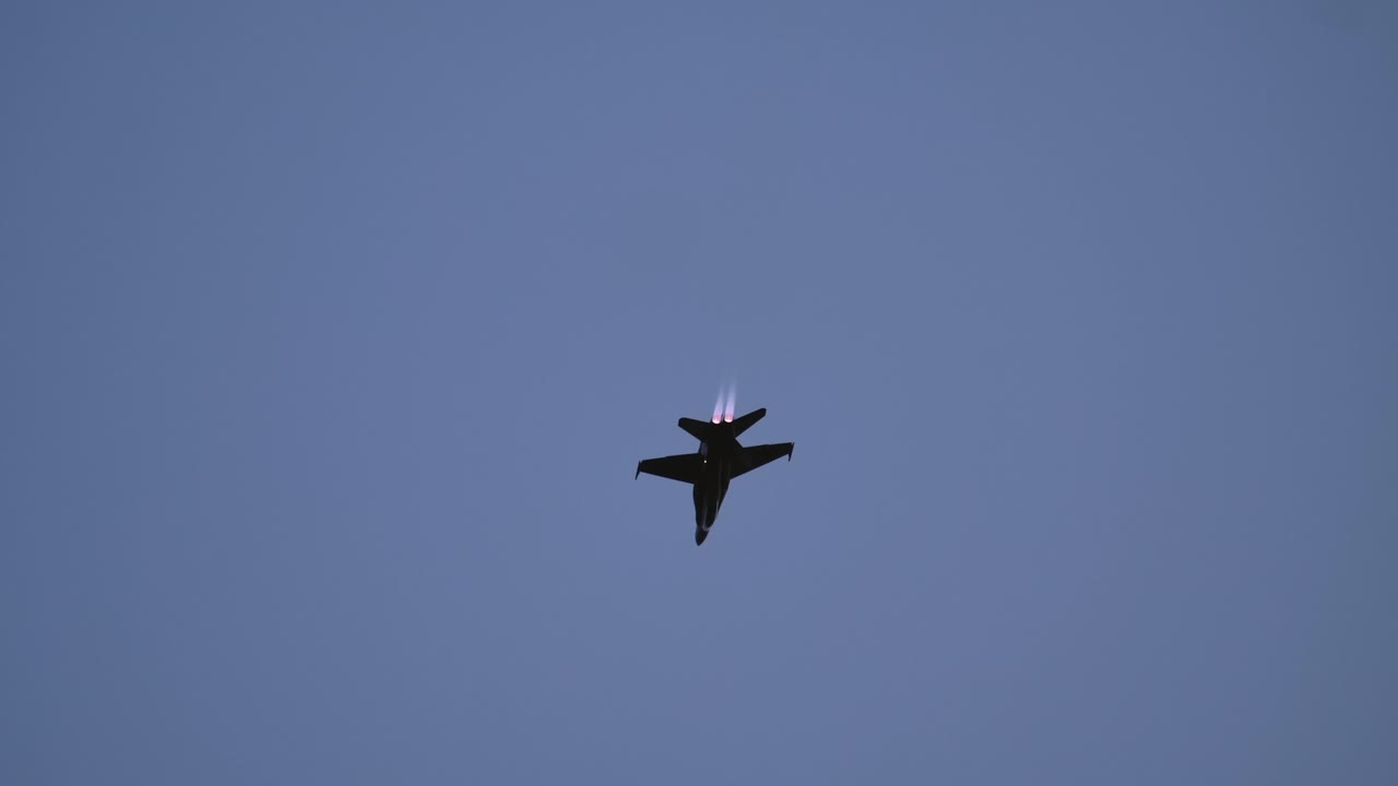 F-18 Fighter Jet Performs an Aileron Roll with Afterburner during the Nightfall Solo Display at Abbotsford Airshow TRACK