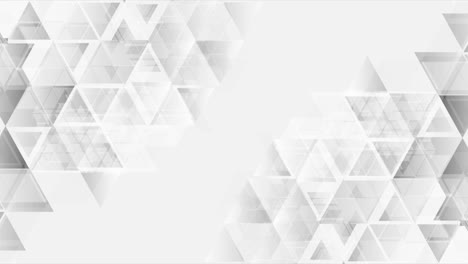 triángulos grises brillantes tecnología abstracta fondo de movimiento