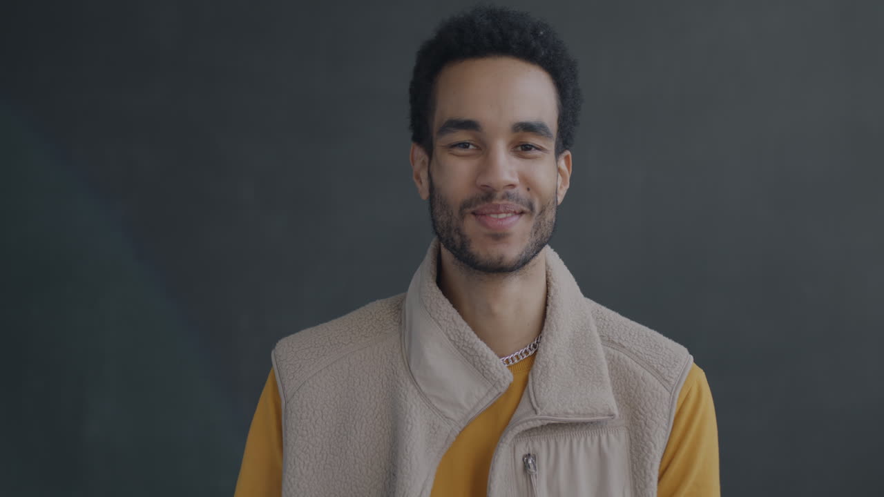 Smiling Man Giving the Okay Sign