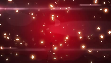 animation of christmas stars falling on red background