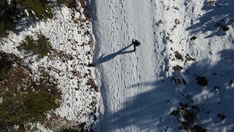 man snow hiking