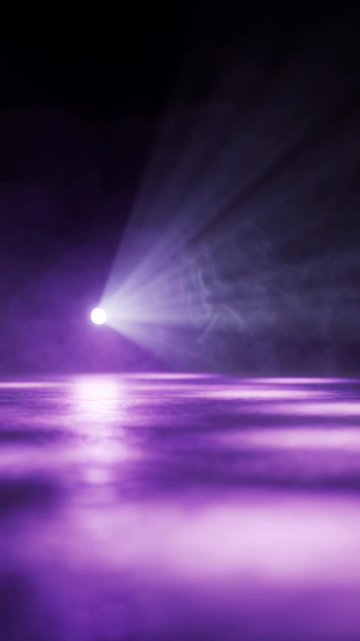 Vertical video: Appearing orb issuing fan beams through purple haze in studio, reflecting on floor