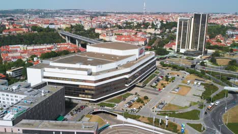 building of prague congress centre, aerial drone static or steady view from far, traffic in background