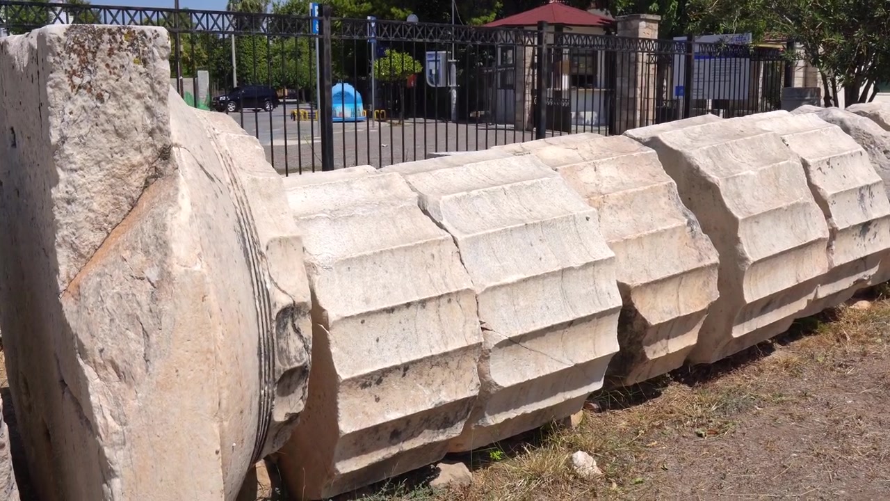 Fallen ancient column at the ancient ruins of Eleusis in Greece