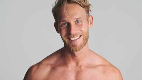 Shirtless-man-showing-beautiful-smile