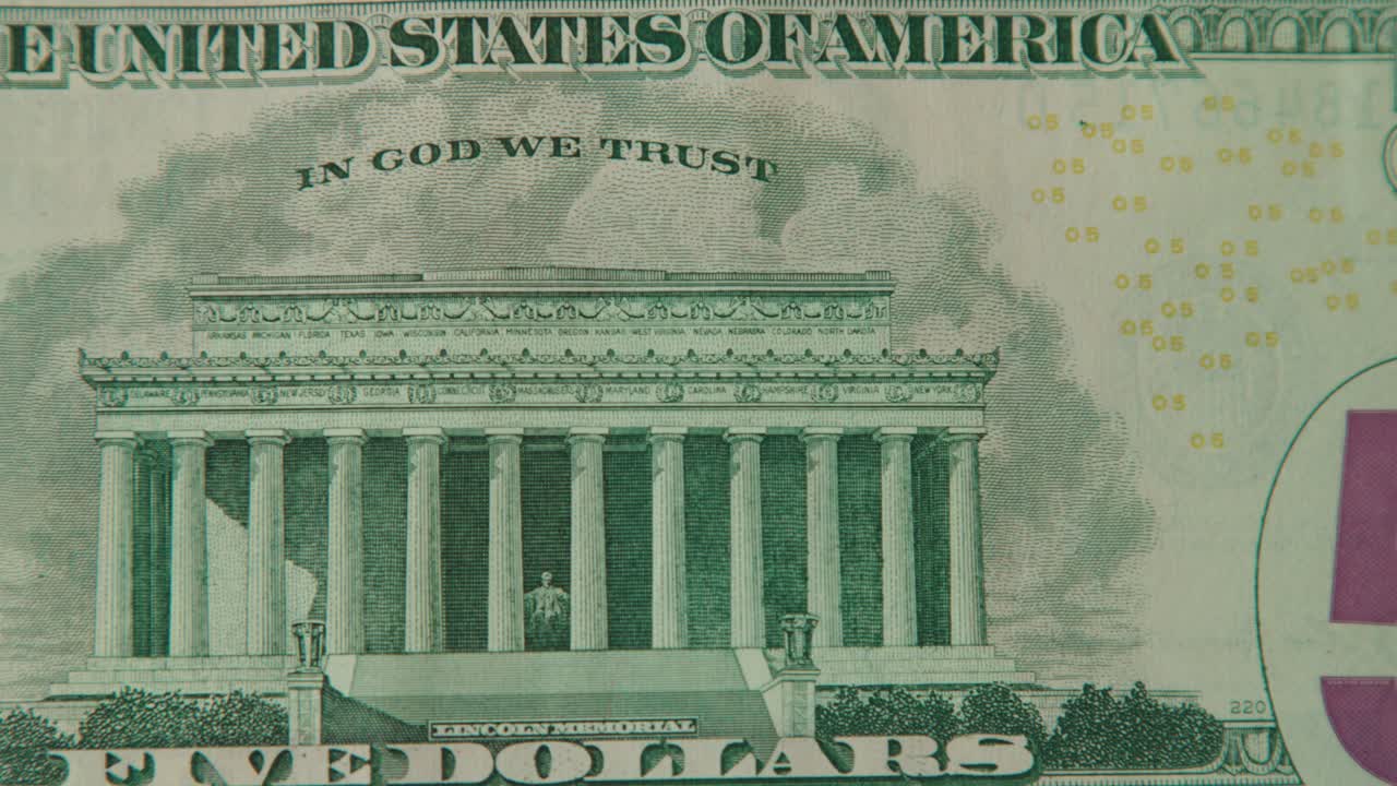 5 US Dollars bill extreme close up, macro