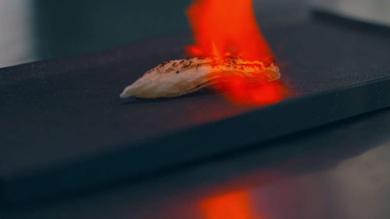 bacalao flameado para preparar pericana, un plato típico de alicante, españa, mediterráneo