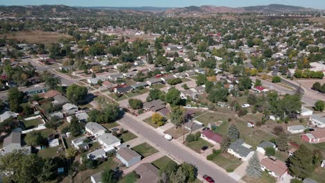 drone flying up and forward over several homes and neighborhood streets