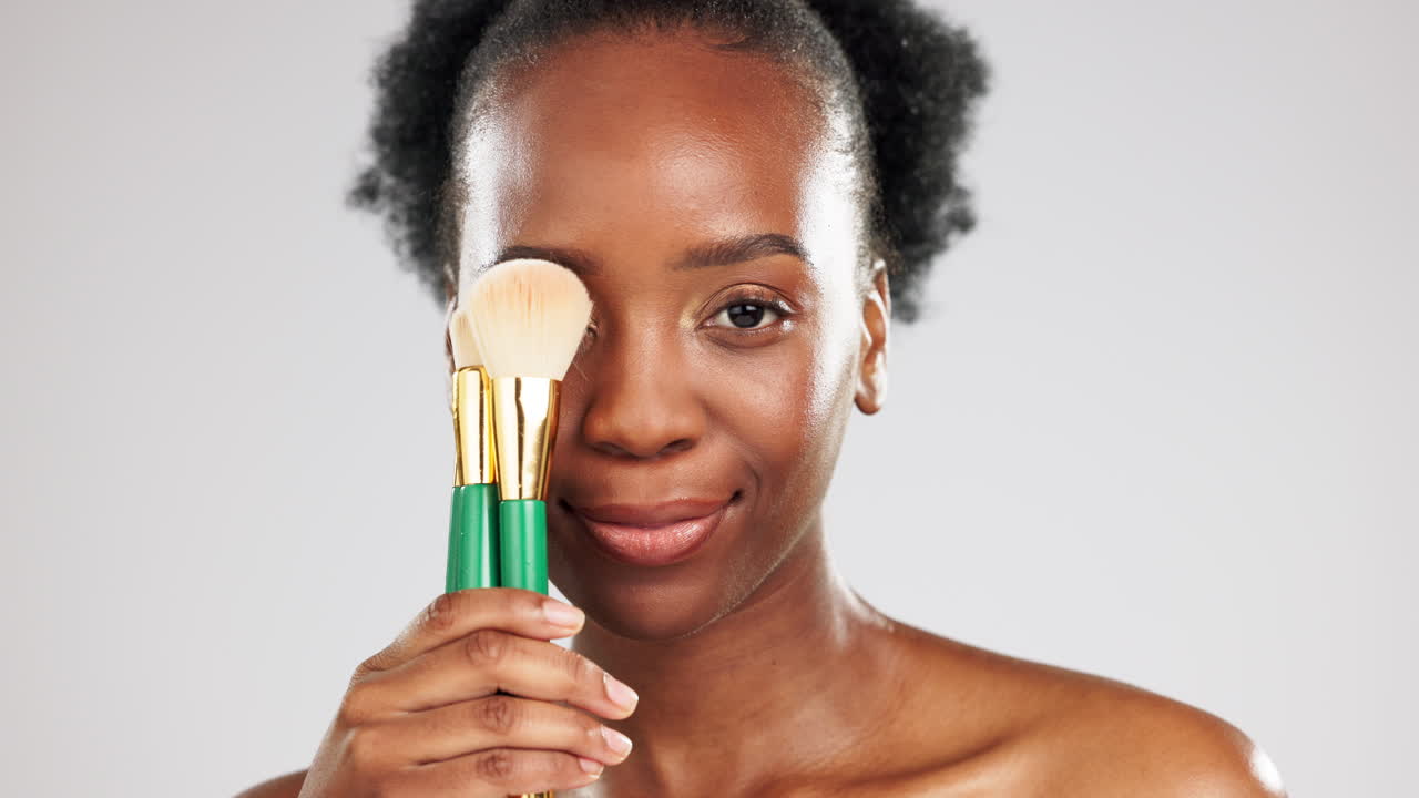 Face, makeup smile and black woman with brushes