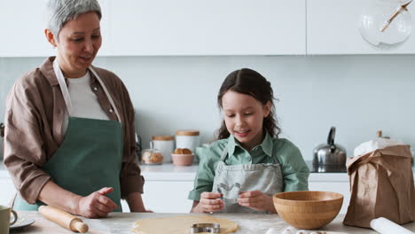 grandma and girl baking