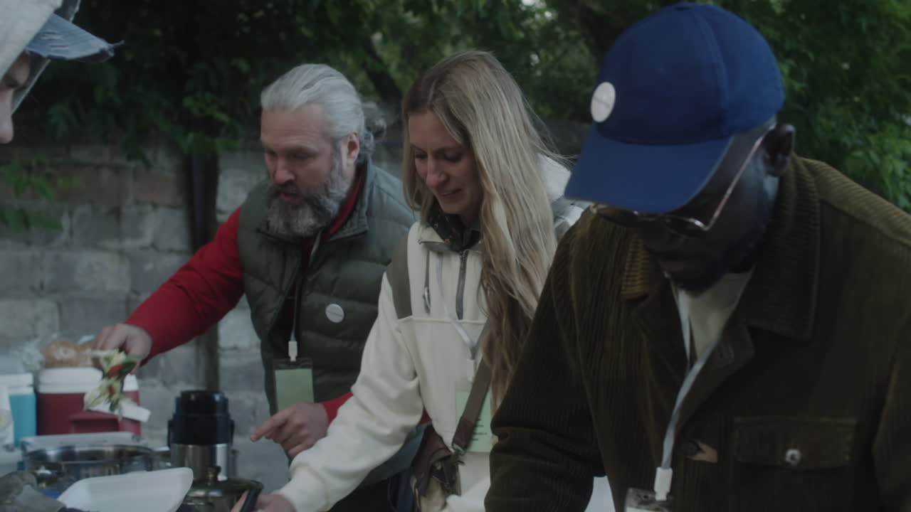 Volunteers and community members at a food distribution event