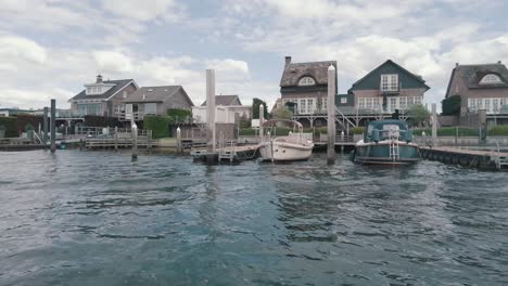 villa district at waterside with personal jetty's and boat's in the netherlands