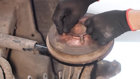 Automotive Repair: Working on a Car's Brake Drum or Wheel Hub