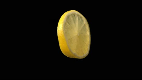 Lemon-slice-rotating-in-front-of-blank-background