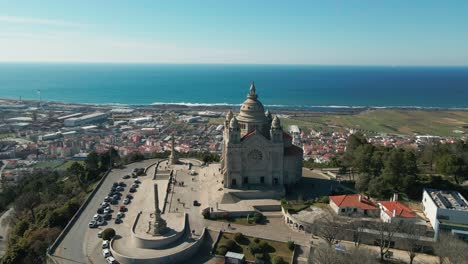 Elevated-view-of-Santa-Luzia-sanctuary,-Viana-do-Castelo's-icon,-Portugal,-overlooking-sea-and-city---Aerial
