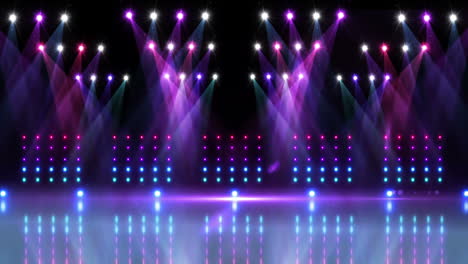 escenario bajo focos púrpuras y azules