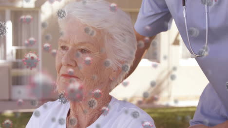 animation of coronavirus covid-19 cells spreading over senior caucasian woman and medical worker